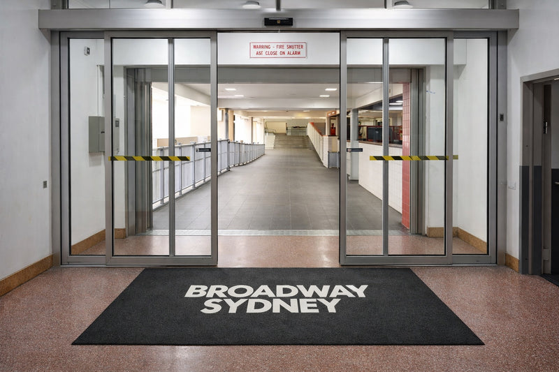 PrintPlush Logo Mat featuring a custom Broadway Sydney design with vibrant colors and detailed logo printing.
