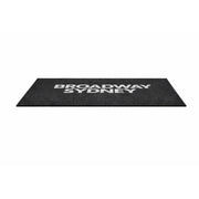 PrintPlush Logo Mat featuring a custom logo design, shown from a front angle, ideal for branded entrance decor.