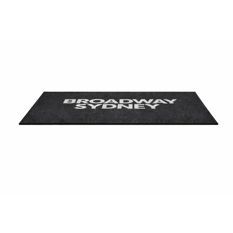 PrintPlush Logo Mat featuring a custom logo design, shown from a front angle, ideal for branded entrance decor.